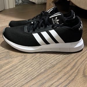 Adidas black and white swift run women’s shoes.